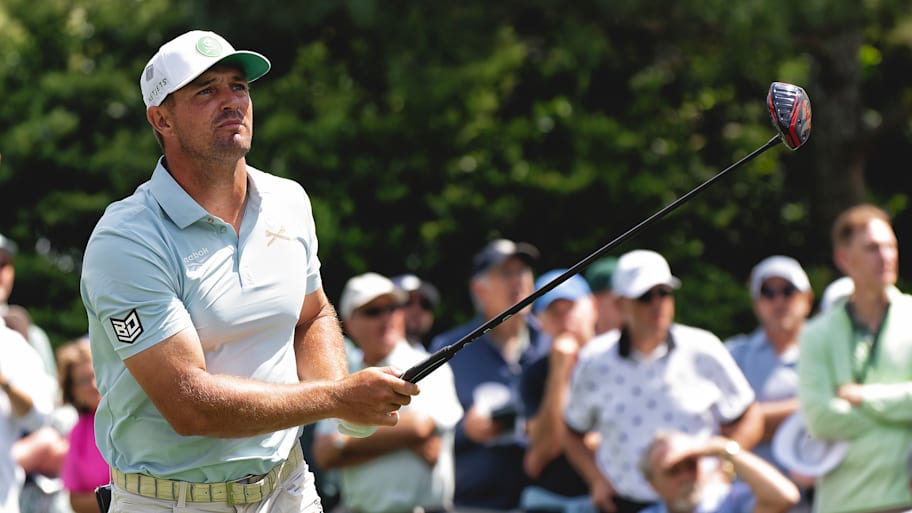 Bryson DeChambeau looks on after a drive.