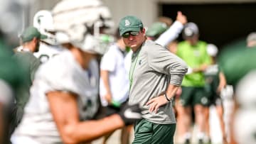 Michigan State's head coach Jonathan Smith looks on during the first day of football camp on Tuesday, July 30, 2024, in East Lansing.