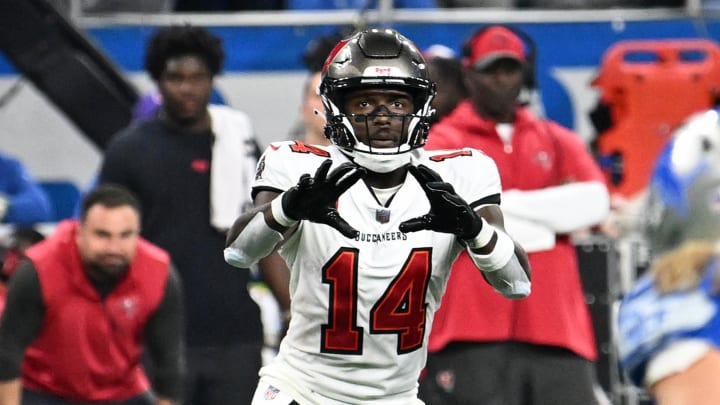 Jan 21, 2024; Detroit, Michigan, USA; Tampa Bay Buccaneers wide receiver Chris Godwin (14) makes a catch against the Detroit Lions during the first half in a 2024 NFC divisional round game at Ford Field. Mandatory Credit: Lon Horwedel-USA TODAY Sports