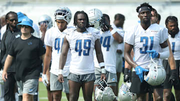 Detroit Lions defensive back Starling Thomas V (49) walks off the field after training camp Tuesday,