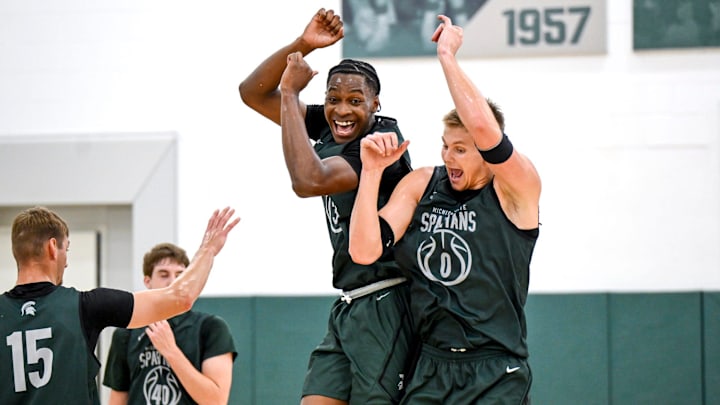Michigan State's Cam Ward, left, and Jaxon Kohler celebrate during the first day of basketball practice on Monday, Sept. 22, 2025, at the Breslin Center in East Lansing.