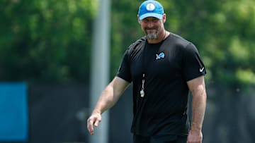 Lions coach  walks off the field after practice during minicamp at in Allen Park on