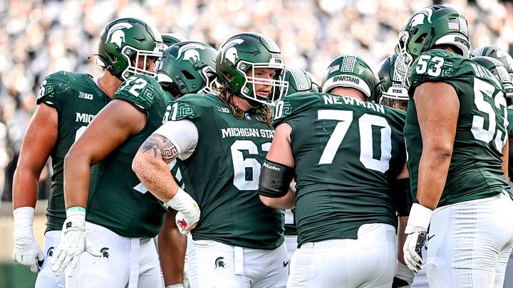 Michigan State's offensive line, from left, Ashton Lepo, Dallas Fincher, Tanner Miller, Luke Newman and Brandon Baldwin huddle up during the fourth quarter in the game against Prairie View A&M on Saturday, Sept. 14, 2024, at Spartan Stadium in East Lansing.