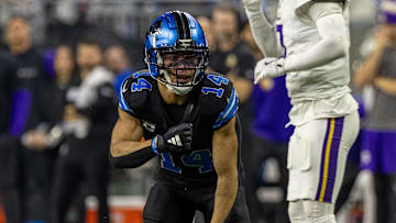 Jan 5, 2025; Detroit, Michigan, USA; Detroit Lions wide receiver Amon-Ra St. Brown (14) catches the ball for a first down against the Minnesota Vikings during the second half at Ford Field. Mandatory Credit: David Reginek-Imagn Images