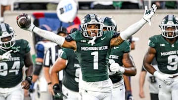 Michigan State's Nikai Martinez celebrates his interception against Florida Atlantic during the second quarter on Friday, Aug. 30, 2024, at Spartan Stadium in East Lansing.