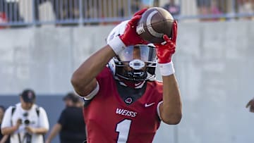Weiss Wolves wide receiver Adrian Wilson (1) warms up before the game against the Temple Wildcats at the District 12-6A football game on Friday, Sept 29,20 2023, at the Pfield Stadium - Pflugerville, TX.