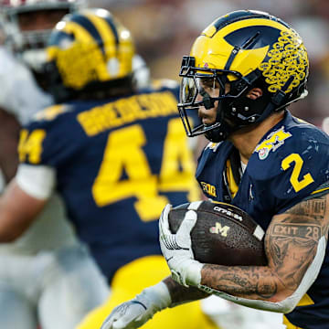 Michigan running back Blake Corum (2) runs against Alabama during the second half of the Rose Bowl in Pasadena, Calif., on Monday, Jan. 1, 2024.