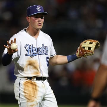 Hooks' Will Wagner confirms an out at third base on Tuesday, May 16, 2023, at Whataburger Field in Corpus Christi, Texas.