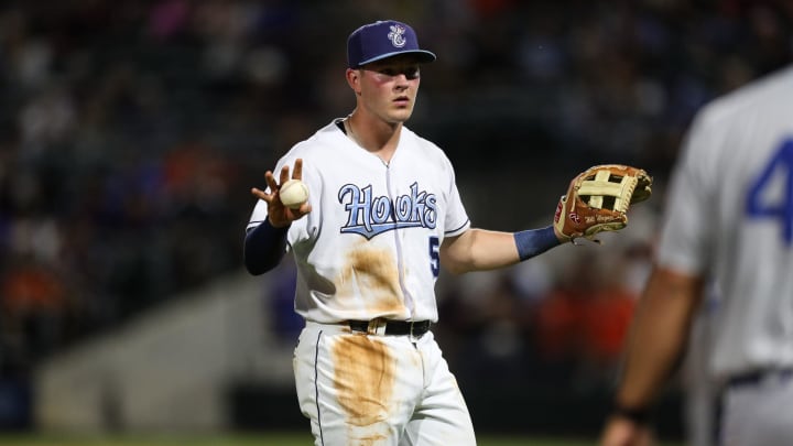 Hooks' Will Wagner confirms an out at third base on Tuesday, May 16, 2023, at Whataburger Field in Corpus Christi, Texas.