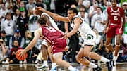 Michigan State's Divine Ugochukwu, right, guards Colgate's Kyle Carlesimo during the second half on Monday, Nov. 3, 2025, at the Breslin Center in East Lansing.