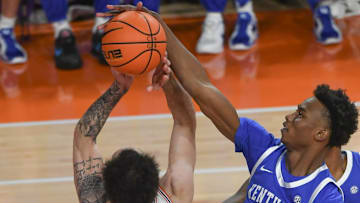 Dec 3, 2024; Clemson, South Carolina, USA; Clemson guard Jaeden Zachery (11) has a shot blocked by Kentucky guard Jaxson Robinson (2) during the first half  at Littlejohn Coliseum. Mandatory Credit: Ken Ruinard-Imagn Images