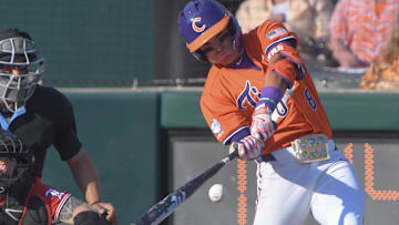 Clemson infielder Josh Paino (8) bats against University of Louisville during the bottom of the fifth inning at Doug Kingsmore Stadum in Clemson, S.C. Friday, April 18, 2025.