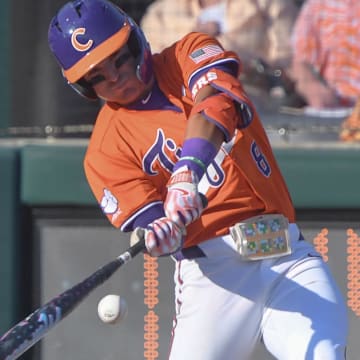 Clemson infielder Josh Paino (8) bats against University of Louisville during the bottom of the fifth inning at Doug Kingsmore Stadum in Clemson, S.C. Friday, April 18, 2025.