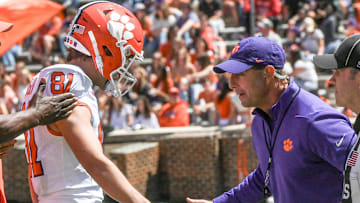 Apr 6, 2024; Clemson, South Carolina, USA; Clemson Tigers kicker Nolan Hauser (81) celebrates with Tigers head coach Dabo Swinney (right) after kicking a field goal during the first quarter of the Clemson spring football game at Memorial Stadium. Mandatory Credit: Ken Ruinard-Imagn Images
