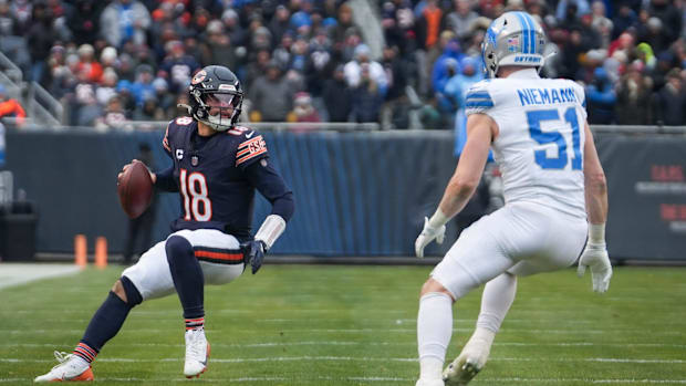 Bears quarterback Caleb Williams (18) looks to pass during a game against the Detroit Lions in 2024