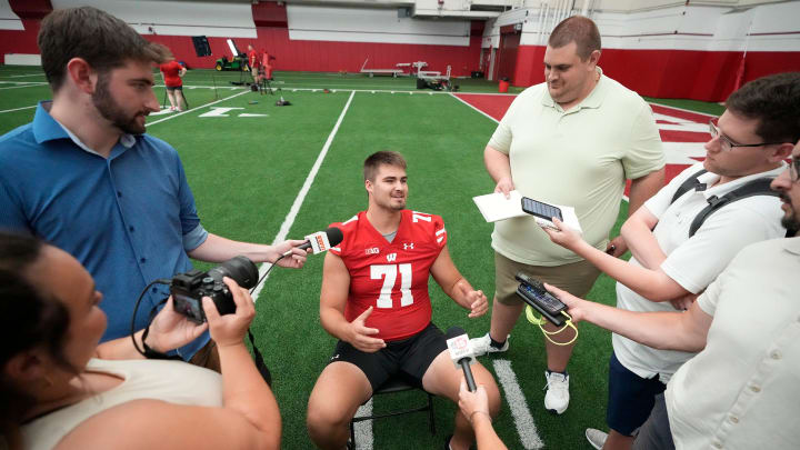 Wisconsin Badgers offensive lineman Riley Mahlman (71) answers questions during Wisconsin Badgers football media day at Camp Randall Stadium in Madison on Tuesday, Aug. 1, 2023.  -  Mike De Sisti / The Milwaukee Journal Sentinel