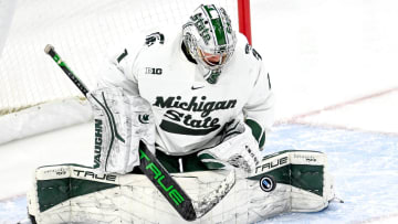 Michigan State's goalie Trey Augustine makes a stop in the first period of the Big Ten tournament game against Ohio State on Saturday, March 16, 2024, at Munn Arena in East Lansing.