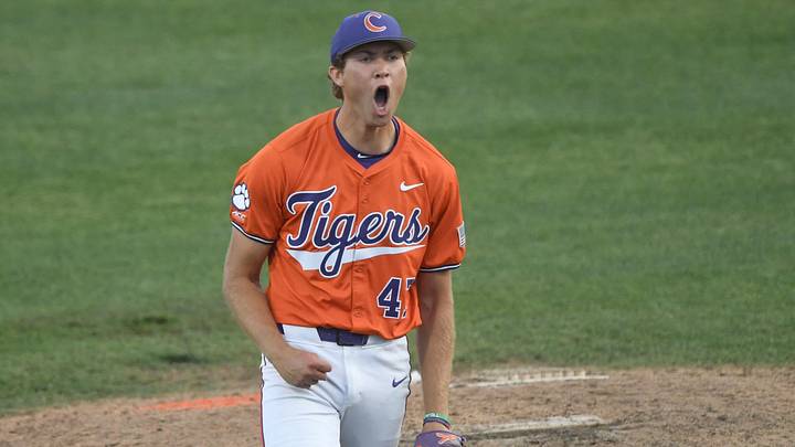 Clemson senior Lucas Mahlstedt (47) reacts after closing out the game against University of Louisville at Doug Kingsmore Stadum in Clemson, S.C. Friday, April 18, 2025. Clemson won 2-1, taking the ACC series.