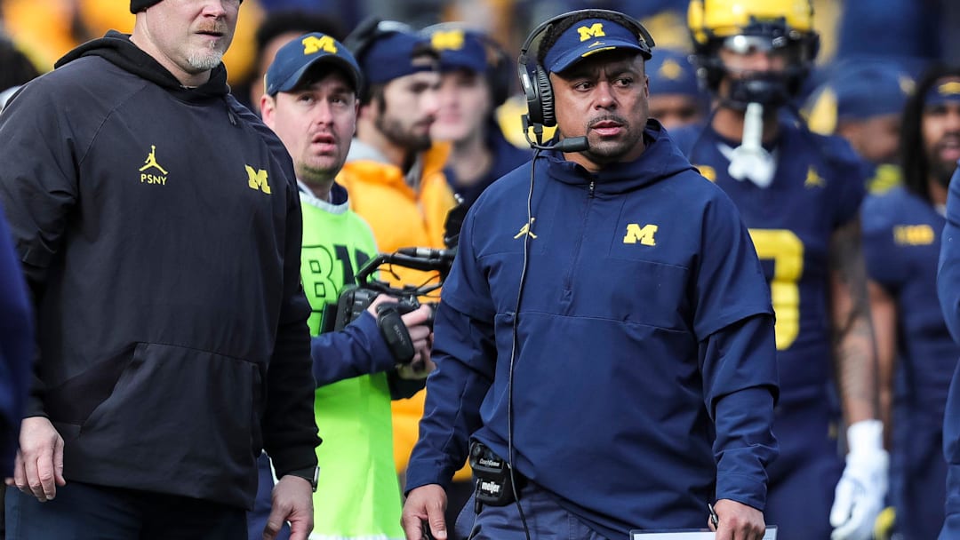 Michigan running backs coach Mike Hart watches a play against Ohio State during the first half at Michigan Stadium in Ann Arbor on Saturday, Nov. 25, 2023.