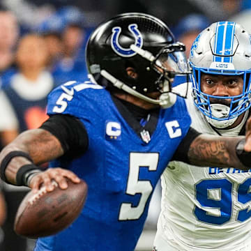 Detroit Lions defensive end Za'Darius Smith (99) pressures Indianapolis Colts quarterback Anthony Richardson