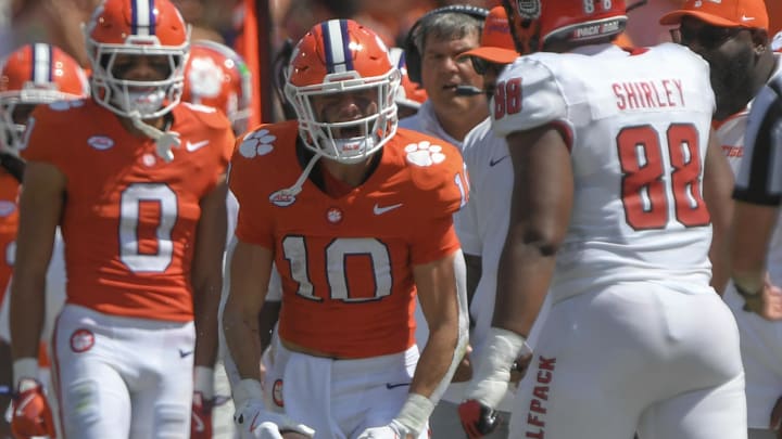 Sep 21, 2024; Clemson, South Carolina, USA; Clemson Tigers wide receiver Troy Stellato (10) reacts after a first down against North Carolina State Wolfpack defensive end Isaiah Shirley (88) during the second quarter at Memorial Stadium. Mandatory Credit: Ken Ruinard-Imagn Images
