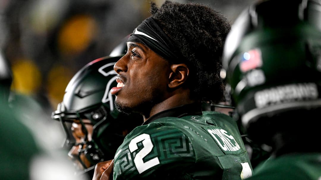 Michigan State's Aidan Chiles looks on from the sideline late during the fourth quarter in the game against Michigan on Saturday, Oct. 25, 2025, at Spartan Stadium in East Lansing.