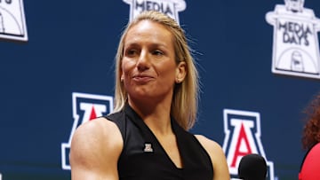 Oct 21, 2025; Kansas City, MO, USA; Arizona head coach Becky Burke speaks to media during Big 12 Womenís Basketball Media Day at T-Mobile Center. Mandatory Credit: Sophia Scheller-Imagn Images