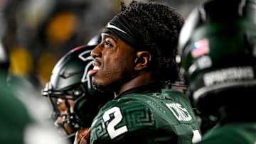 Michigan State's Aidan Chiles looks on from the sideline late during the fourth quarter in the game against Michigan on Saturday, Oct. 25, 2025, at Spartan Stadium in East Lansing.