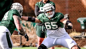 Michigan State offensive lineman Stanton Ramil, right, and Gavin Broscious work out during football practice on Tuesday, April 8, 2025, in East Lansing.