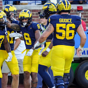 Michigan celebrates the touchdown by running back Donovan Edwards (7) during the 1st quarter against Fresno State at Michigan Stadium in Ann Arbor on Saturday, Aug. 31, 2024.