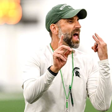 Michigan State's defensive coordinator Joe Rossi gives instructions while working with linebackers during camp on Monday, Aug. 5, 2024, at the indoor practice facility in East Lansing.