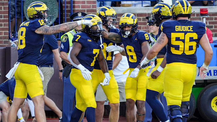 Michigan celebrates the touchdown by running back Donovan Edwards (7) during the 1st quarter against Fresno State at Michigan Stadium in Ann Arbor on Saturday, Aug. 31, 2024.