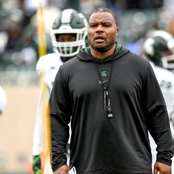 Michigan State's assistant head coach Keith Bhonapha works with the running backs during the Spring Showcase on Saturday, April 20, 2024, at Spartan Stadium in East Lansing.