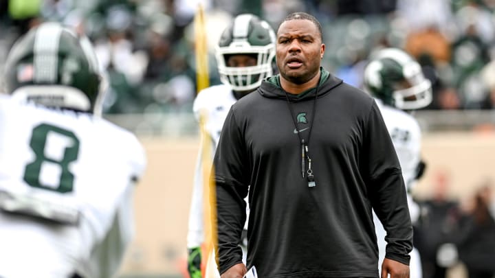 Michigan State's assistant head coach Keith Bhonapha works with the running backs during the Spring Showcase on Saturday, April 20, 2024, at Spartan Stadium in East Lansing.