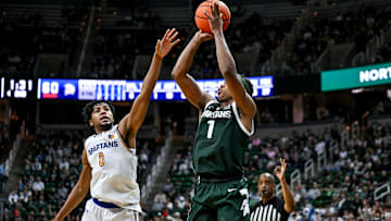 Michigan State's Jeremy Fears Jr., right, makes a 3-pointer as San Jose State's Colby Garland defends during the second half on Thursday, Nov. 13, 2025, at the Breslin Center in East Lansing.
