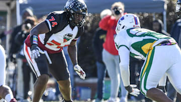 South team offensive lineman Shed Sarratt (74) of Gaffney High blocks during the first quarter of the 2024 Shrine Bowl of the Carolinasat Viking Stadium in Spartanburg, S.C. Saturday, December 21, 2024.