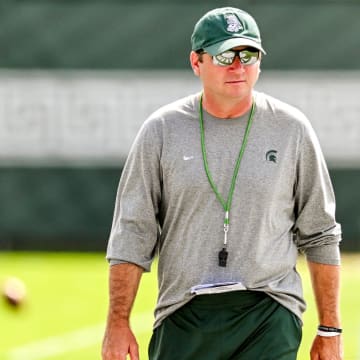 Michigan State's head coach Jonathan Smith looks on during the first day of football camp on Tuesday, July 30, 2024, in East Lansing.