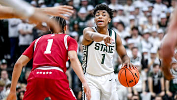 Michigan State's Jeremy Fears Jr., right, communicates with teammates as Indiana's Myles Rice, left, defends during the first half on Tuesday, Feb. 11, 2025, at the Breslin Center in East Lansing.