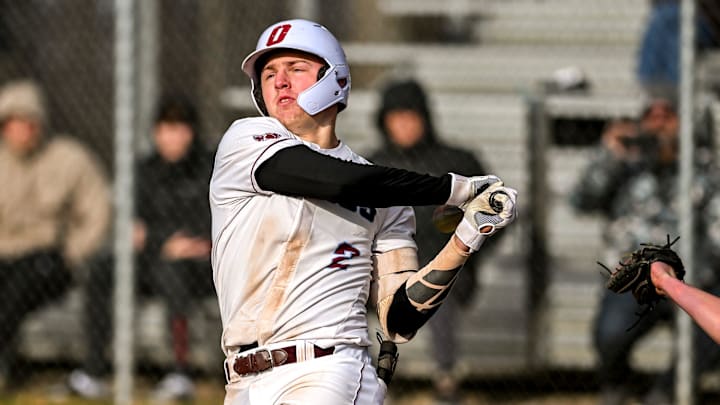 Okemos' Caleb Bonemer swings at a Mason pitch during the seventh inning on Friday, April 5, 2024, at Mason High School.