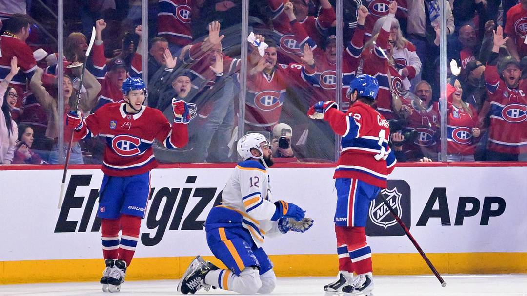 May 10, 2026; Montreal, Quebec, CAN; Montreal Canadiens forward Cole Caufield (13) celebrates with teammate defenseman Lane Hutson (48) after scoring a goal against the Buffalo Sabres during the second period in game three of the second round of the 2026 Stanley Cup Playoffs at the Bell Centre. Mandatory Credit: Eric Bolte-Imagn Images