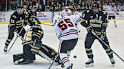 St. Cloud State's Mika Ilvonen tries to get control of the puck in front of the Western Michigan University goal during the Saturday, Jan. 19, game at the Herb Brooks National Hockey Center in St. Cloud. 

Scsu Hock 1