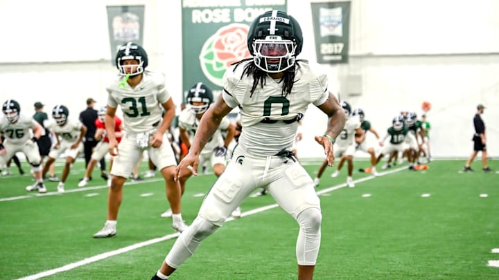 Michigan State's Cam Edwards warms up during spring football practice on Tuesday, April 14, 2026, in East Lansing.