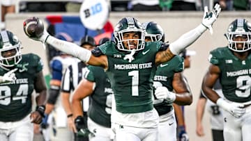 Michigan State's Nikai Martinez celebrates his interception against Florida Atlantic during the second quarter on Friday, Aug. 30, 2024, at Spartan Stadium in East Lansing.
