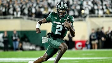 Michigan State's Aidan Chiles runs for a gain against Iowa in the second quarter on Saturday, Oct. 19, 2024, at Spartan Stadium in East Lansing.