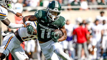 Michigan State's Aziah Johnson breaks tackles on his way to a touchdown against Prairie View A&M during the first quarter on Saturday, Sept. 14, 2024, at Spartan Stadium in East Lansing.