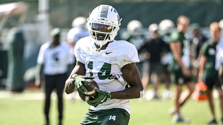 Michigan State's Malcolm Bell catches a ball during football practice on Monday, Aug. 11, 2025, in East Lansing.