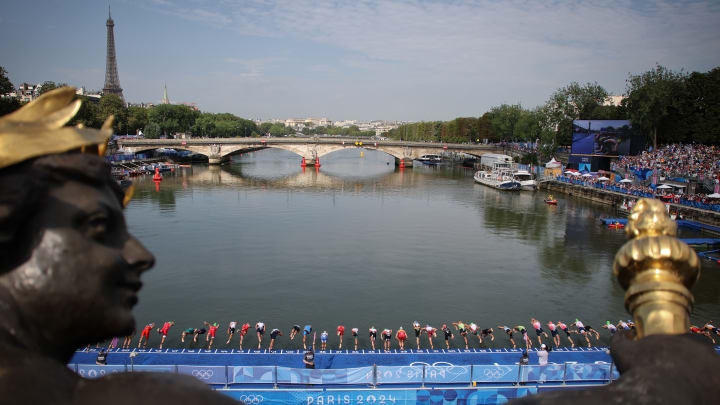 How will triathletes be impacted after swimming the Seine?