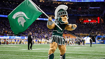 Sparty cheer for Michigan State before kickoff of the Peach Bowl at the Mercedes-Benz Stadium in Atlanta, Ga. on Dec. 30, 2021.