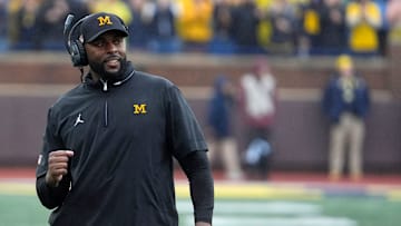 Michigan football coach Sherrone Moore celebrates a play during first-half action between Michigan and Minnesota at Michigan Stadium in Ann Arbor on Saturday, Sept. 28, 2024.