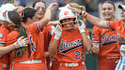 Clemson freshman Taylor Pipkins (22) is greeted by teammates after a walk-off RBI double after the Tigers beat the Spartans 10-2 in the NCAA Softball Tournament Clemson Regional at McWhorter Stadium in Clemson Friday, May 16, 2025.